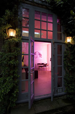 View into a London flat from the outdoor garden