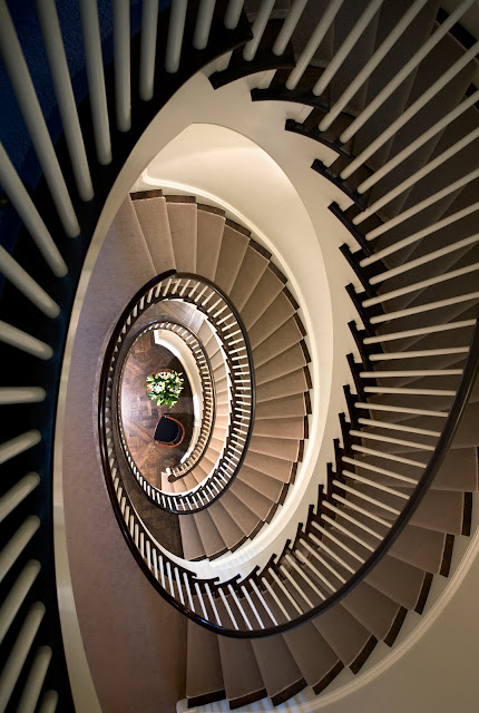 View from the top of a spiral staircase by Peter Pennoyer