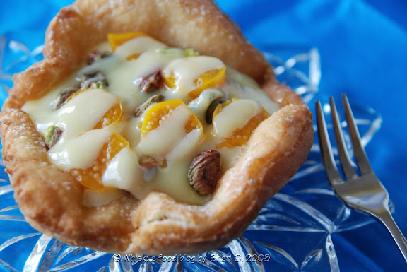 White Chocolate Toasted Pistachio with Ground Cherries and Passion Fruit Filling in deep-fried pizza dough