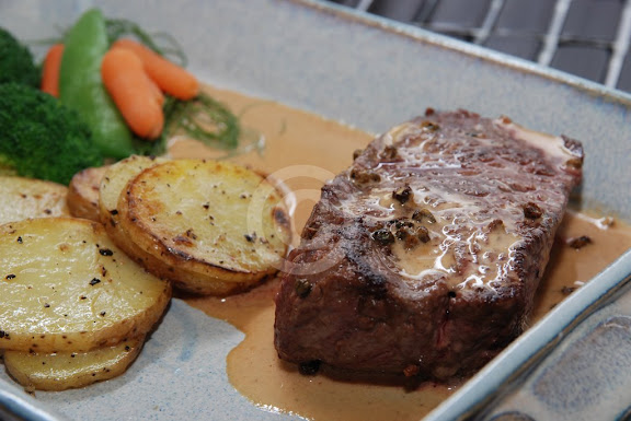 Steak au poivre vert