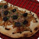 Pissaladière (Salted yeast dough with onions, anchovies and olives)