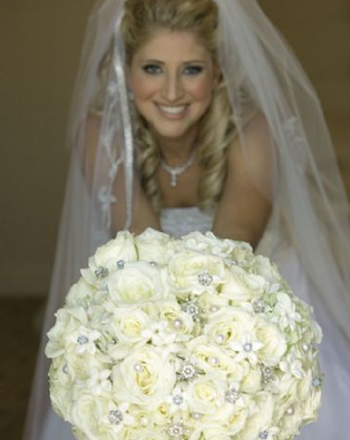 This is an amazing white bouquet with crystal pearls and even snowflakes 