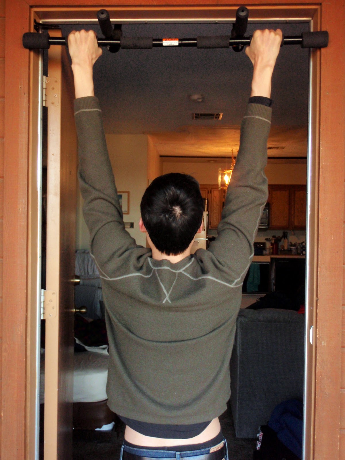 Maggie at Yoga Plus Hanging to Straighten and the Spine