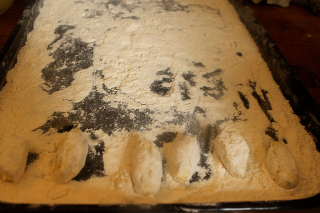 Giving them a little shake in flour, ricotta gnocchi