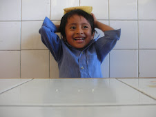 Mexican boy with tortilla on his head