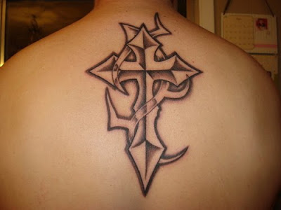 jesus on cross silhouette. The Jesus cross tattoo is a