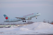 An Air Canada Airbus A320 on a scheduled flight from Orlando International . (winter)