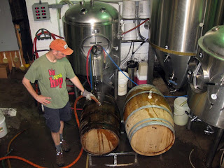 Scott cleaning out barrels before filling them with kvass. Scott cleaning out barrels before filling them with kvass.