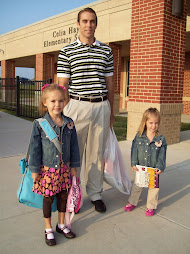 Daddy, Ashlynn, and Kayli outside Celia Hays Elementary School