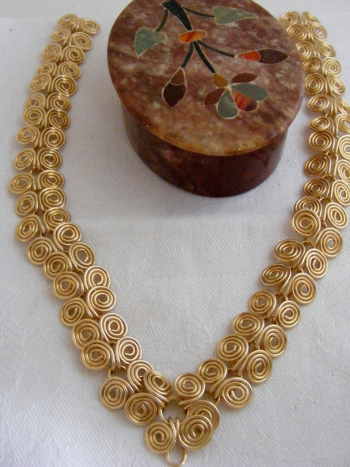 JEWELRY EXPRESSIONS BY ANITA EGYPTIAN COIL NECKLACE IN BRONZE WIRE