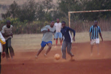 Youth in my area playing soccer.