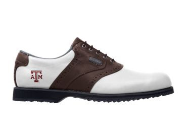 Texas A & M golf shoe that is brown and white with a red school logo near the heel above the soft rubber cleats.