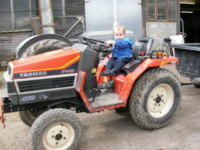 driving a tractor at farmer giles working farm near salisbury