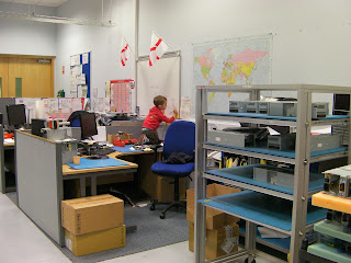 disc drive manufacturing plant office with england flags