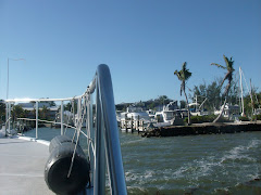 YOUNG AMERICA crosses her wake entering the marina at Banana Bay after 337 days 'at sea'