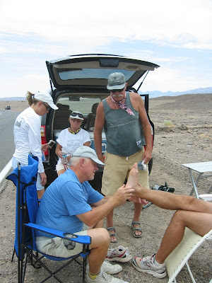 John Vonhof patches my blisters 25 miles into the 2007 Badwater race.