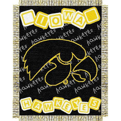 U of Iowa Hawkeyes baby blanket that is gold and black.