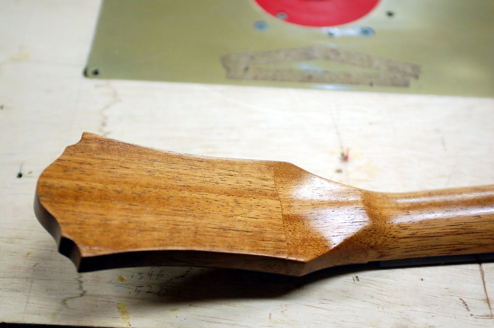 ThreeQuartersLeft French polishing the guitar