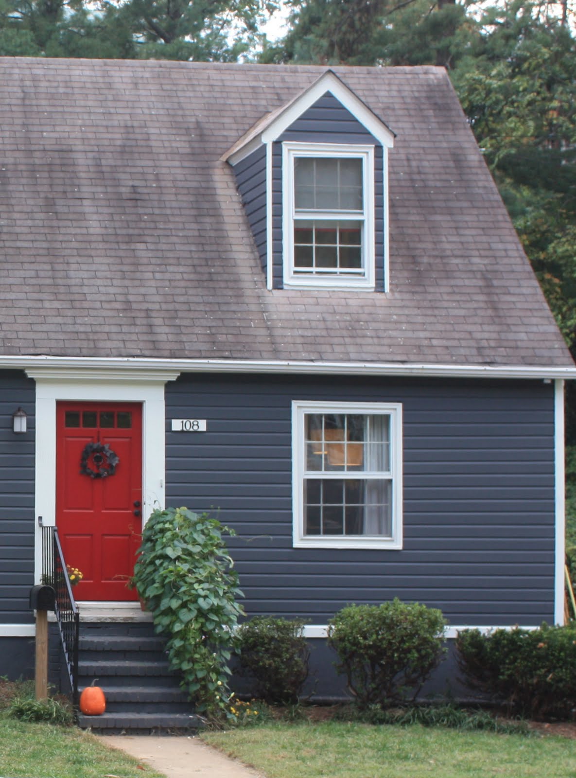 Dried Figs And Wooden Spools Blue House Red Door