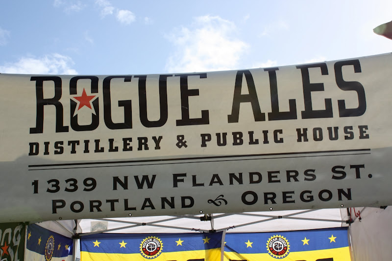 A photo of a banner that reads Rogue Ales