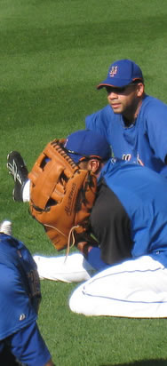 [santana_hiding_face_glove.jpg]