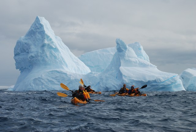 Sea kayaking with Louise behind Petermann Island, Antarctic Peninsula.