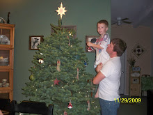 Decorating our Christmas tree 2009