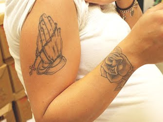 praying hands arm tattoo design