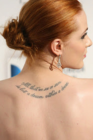 lettering tattoo on ack. lettering tattoo on back. lettering tattoo on ack.