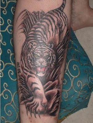 tigers tattoos. designs baby tiger tattoos