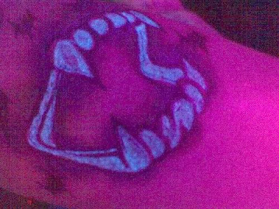 Labels: backpieces, blacklight, tattoos, text, uv Labels: backpieces, blacklight, tattoos, text, uv