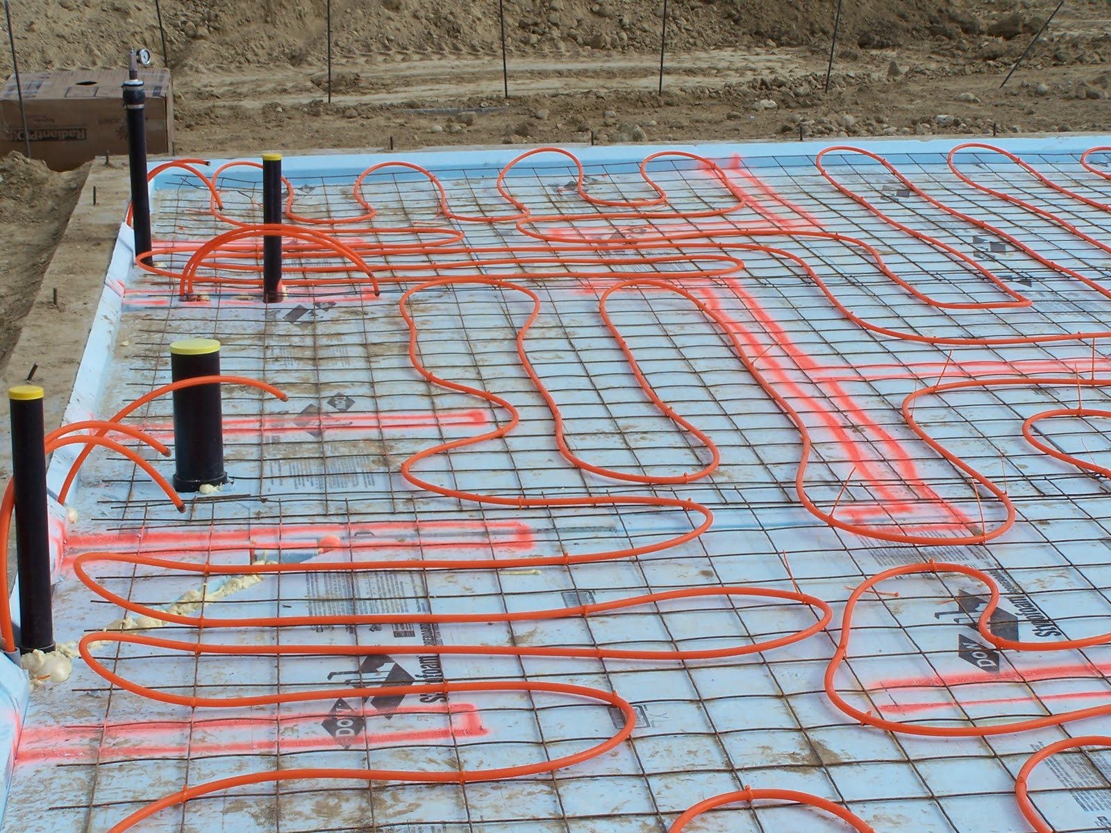 Home Construction Underslab insulation, radiant heat, and rain!