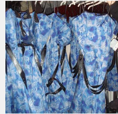 Pictured: The McQ "Blue Tattooed" Strapless Dress on the shopping racks and
