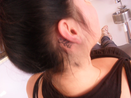 Flower Tattoo Behind Ear. a tattoo behind my ear.