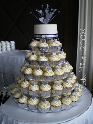 The first was a sparkling cupcake tower Silver paper and cachous and a 
