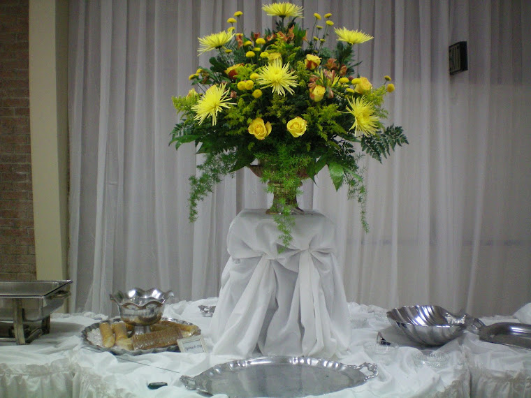 My brother Eddie Prepared the flower arrangements for the wedding! So talented!