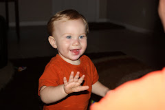 Playing the drum with his daddy