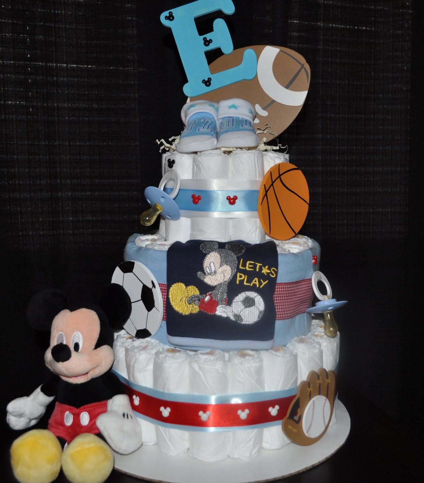 It's a... Diaper Design! Sports Mickey Mouse Diaper Cake
