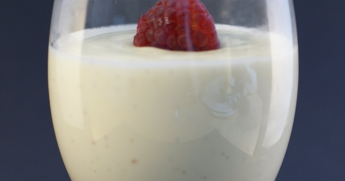 The Merlin Menu Vanilla Cream Cheese Panna Cotta w/Raspberry Sauce