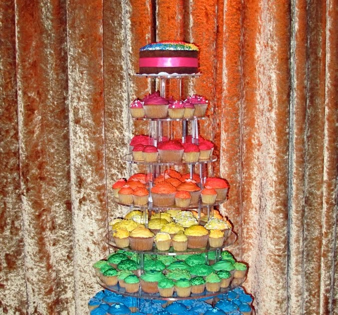 Rainbow cupcake tower and more custom cupcakes by Crumbs and Doilies