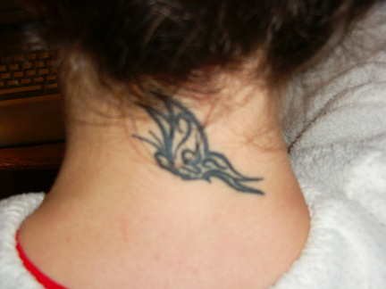 Tribal Tattoos On Back Of Neck. celebrity neck tattoos. neck