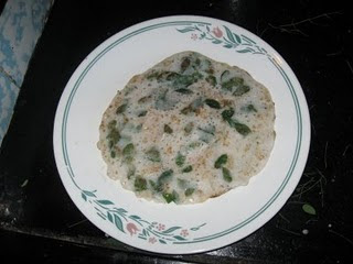 Coconut dosa with drumstick leaves