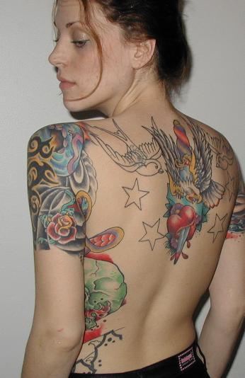 female back tattoo. Lower ack tattoos