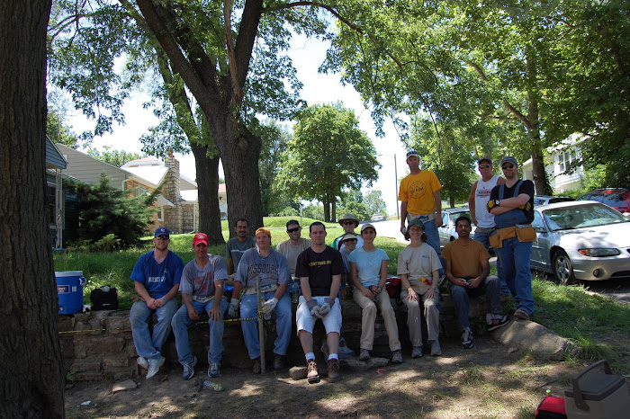 Co-workers and I building a Habitat for Humanity House