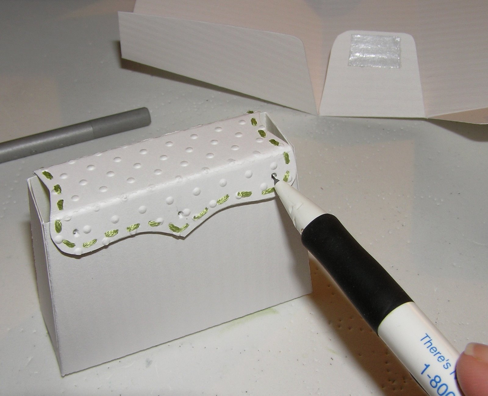 [mark+holes+w+pencil.JPG]