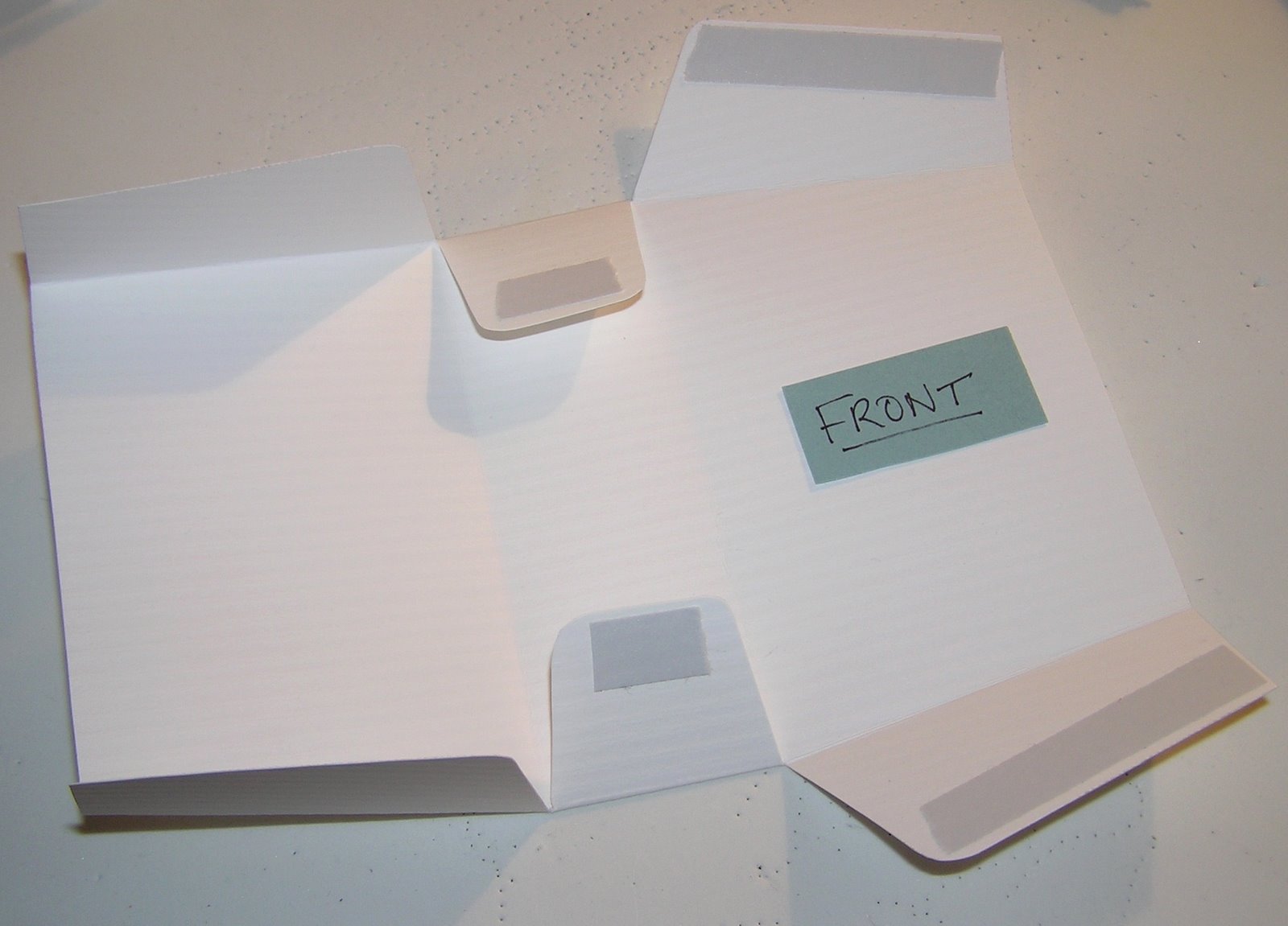 [adhesive+placement+on+purse+box.JPG]