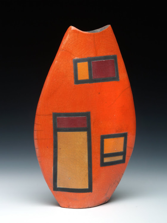 Tall orange flounder vase