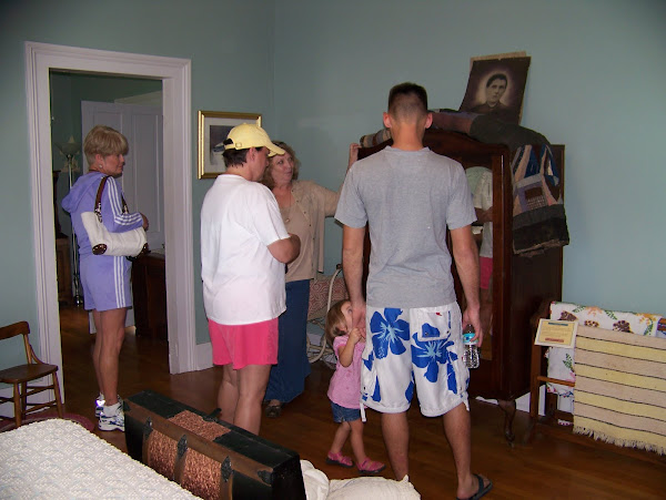 Visitors tour the Heritage Museum known to locals as the "Mock House" because Ms. Mock lived there