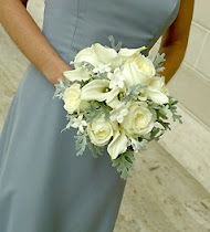 Dusty Miller is a beautiful and unique addition to this all white bouquet.