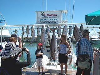 mom and son with kingfish and tuna